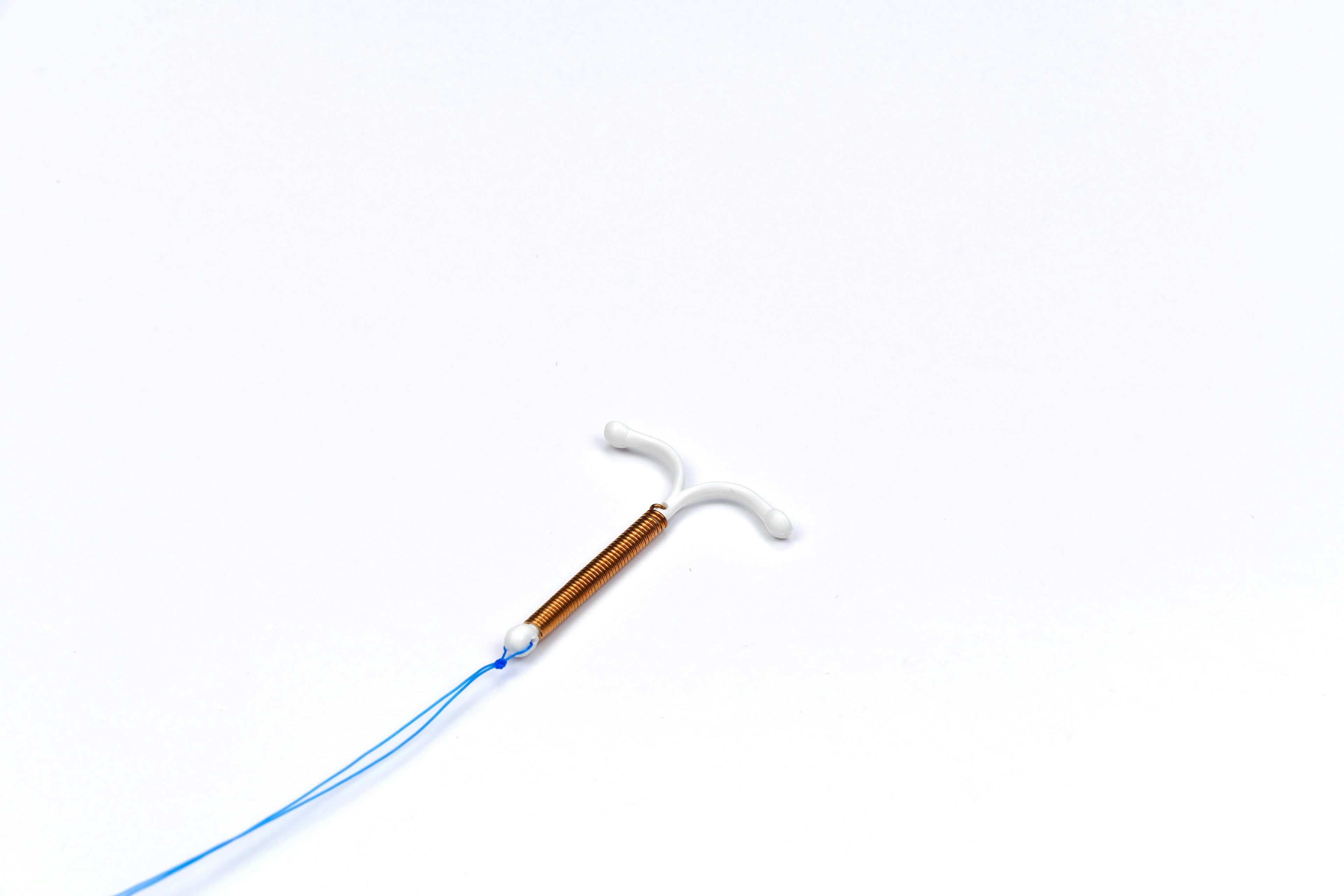 Copper IUD continuation, adverse effects, and cost