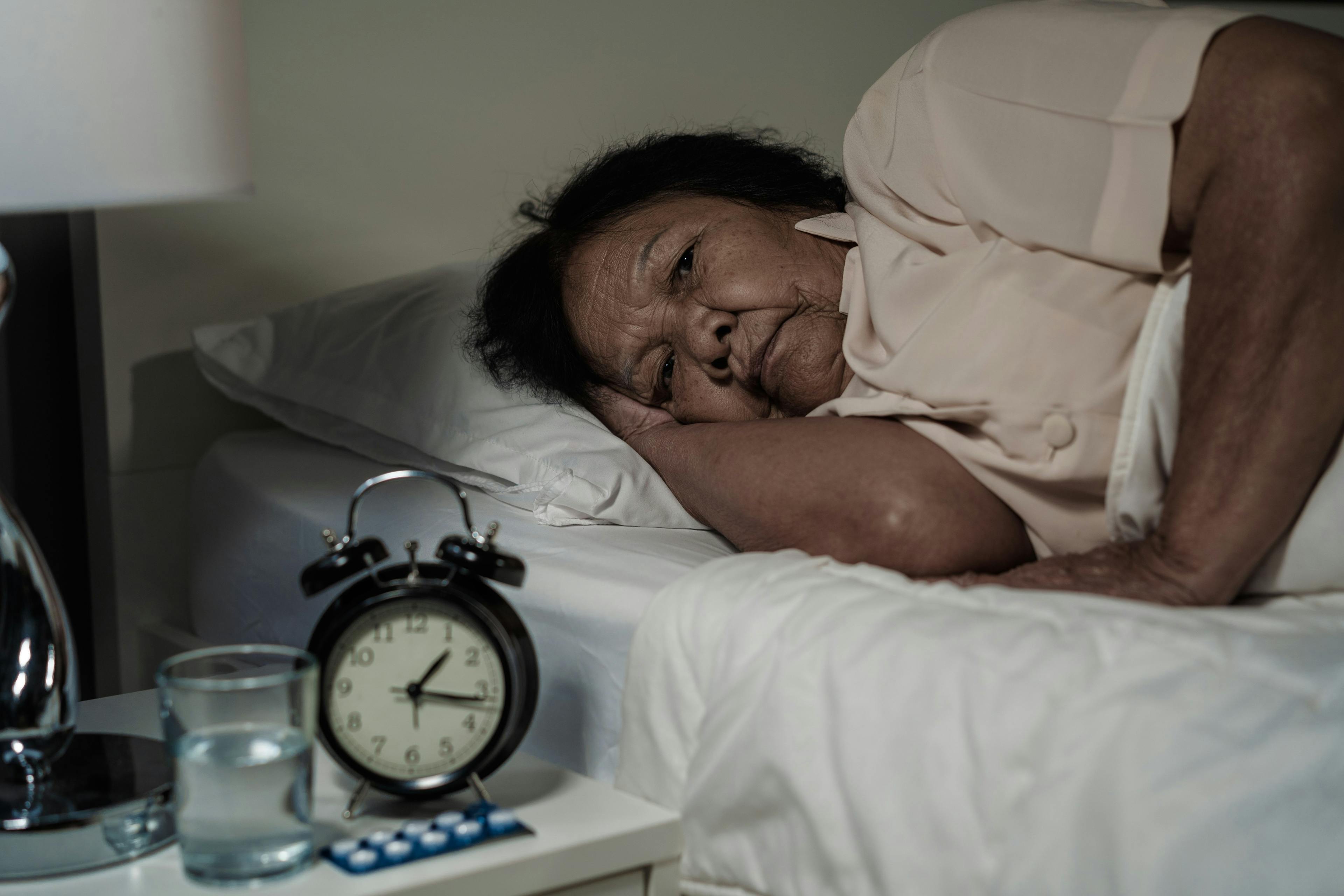 older woman in bed